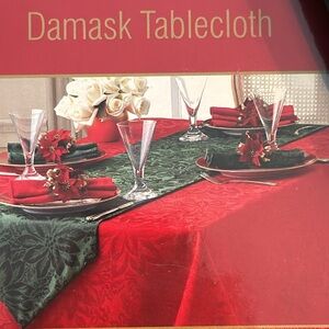 NWT 70” Oblong Damask Poinsettia Holiday Tablecloth